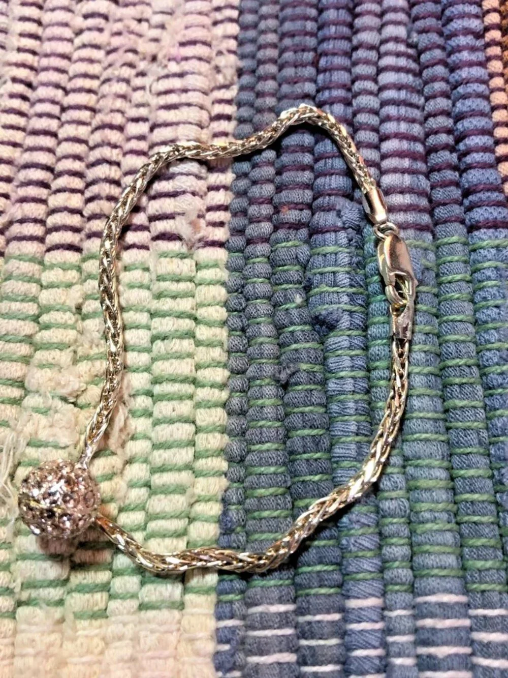 8 inch sterling silver lariat slide bracelet with rhinestone glitter ball. 8+ gr